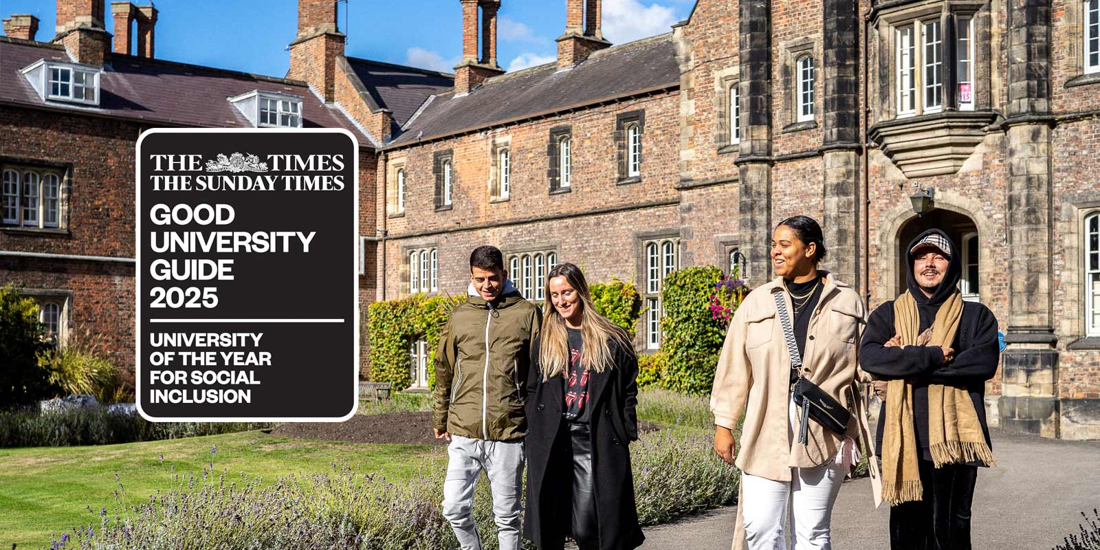 Four students walking together on campus. Overlaid is The Times Good University Guide 2025 University of the Year for Social Inclusion logo.