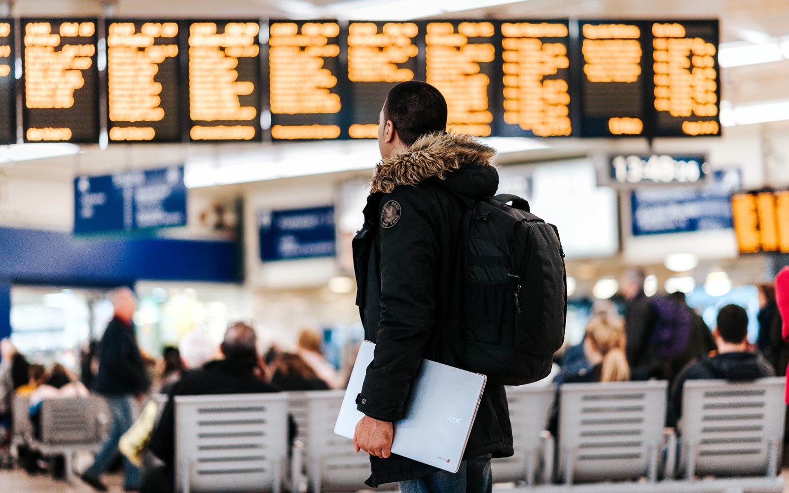 Person with a backpack stood in the airport