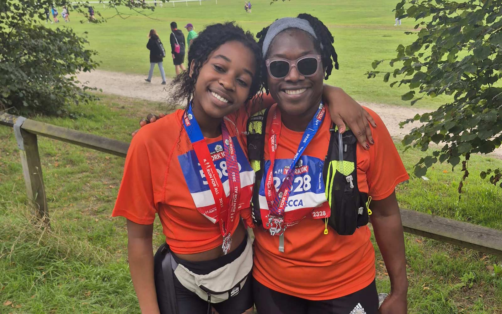Two members of York 10K team, fundraising for the York St John alumni-funded scholarships
